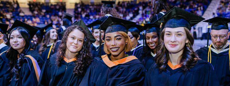 graduates in cap and gown