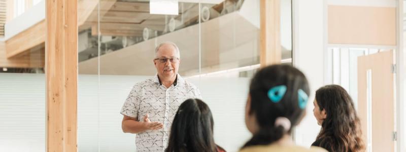 man teaching in classroom