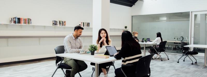 international students seated at table