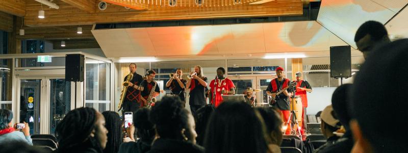 Music group playing with a crowd in Kuhn Centre Atrium 