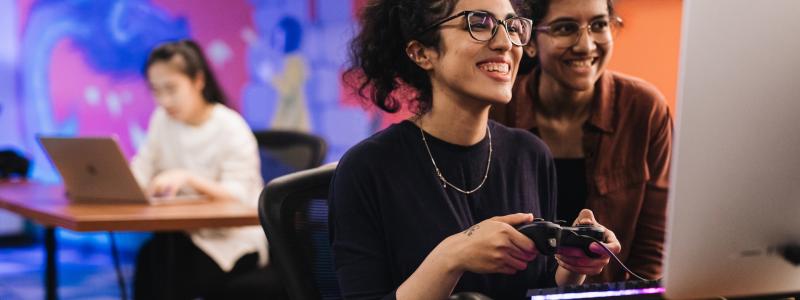 students playing a video game in a lab