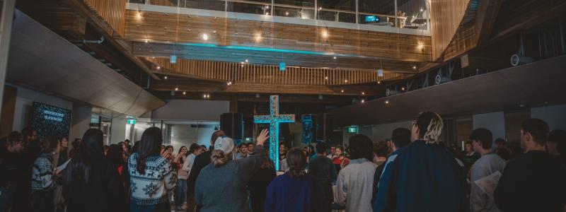 Students worshipping at Sunday Night Alive