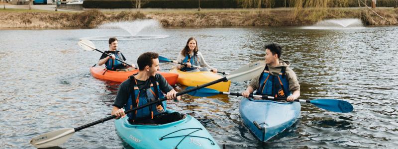 Four people in canoes