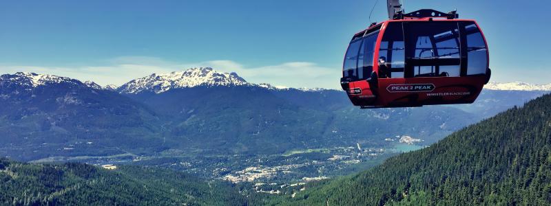 A gondola against the background of mountains.