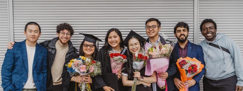 Group photo of friends at graduation