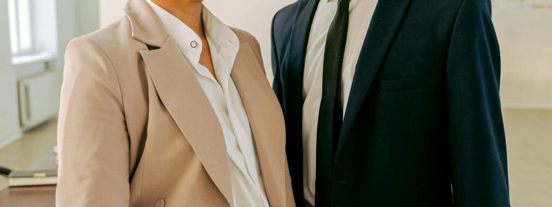 Man and woman dressed in suits