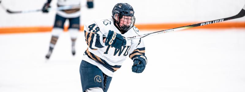 TWU student playing hockey 