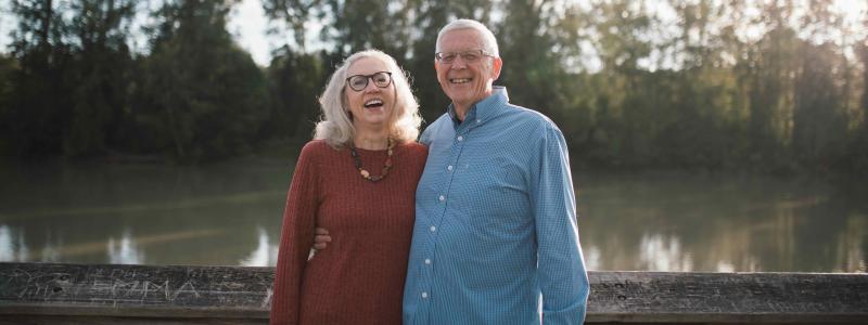 Darwin and Darlis Anderson standing together and smiling at the camera.