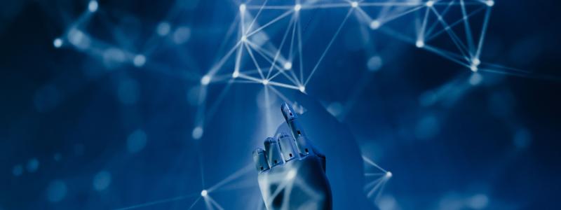 Hand interacting with a digital network of connected points and lines, representing artificial intelligence and data technology.