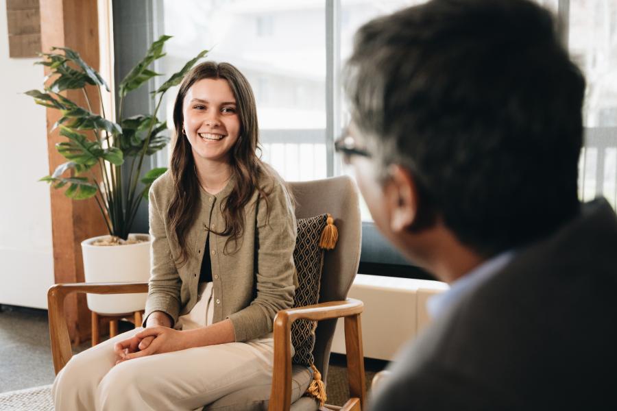 student talking to professor