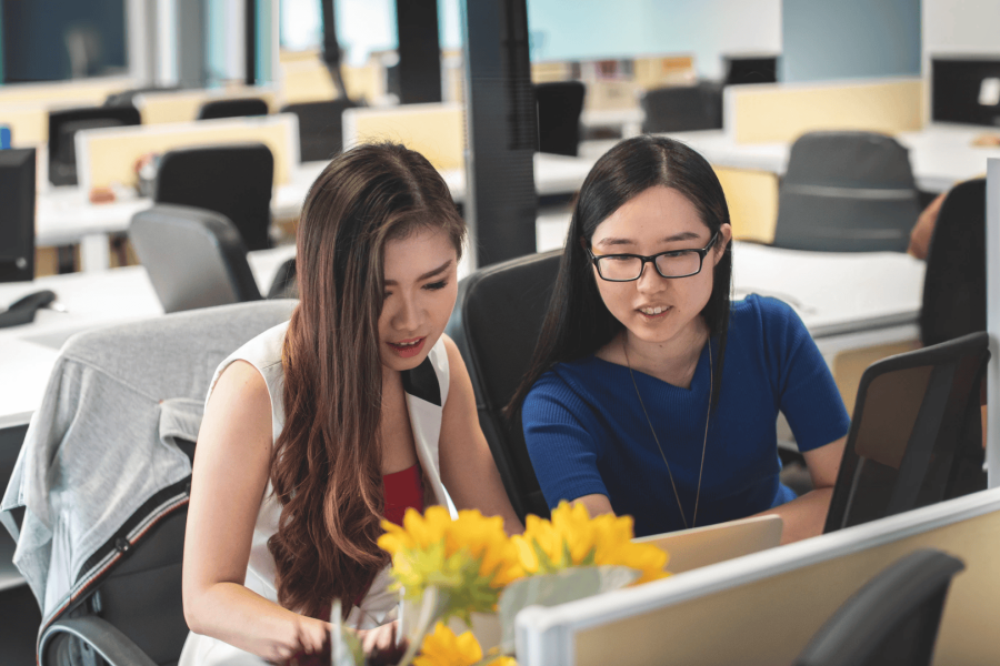 two women working in office