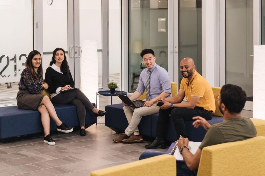 Richmond students and staff sitting and talking