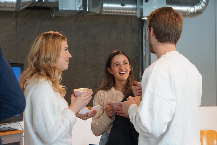 people talking over coffee
