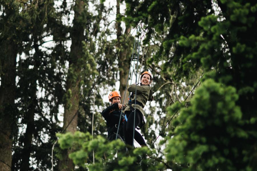 Two people on a rope course