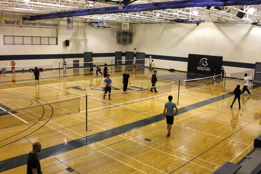 people playing badminton in the Gym