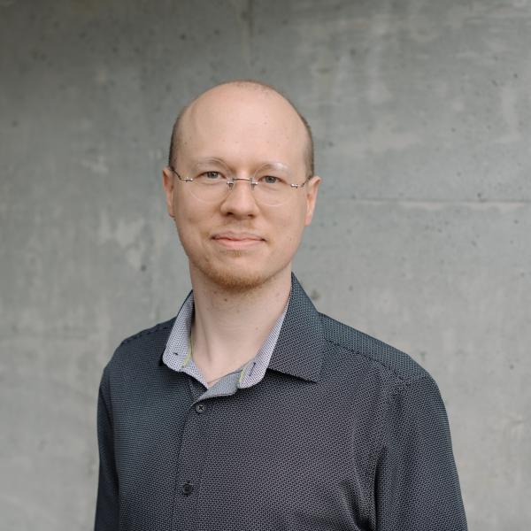 headshot of Andrey Goncharov