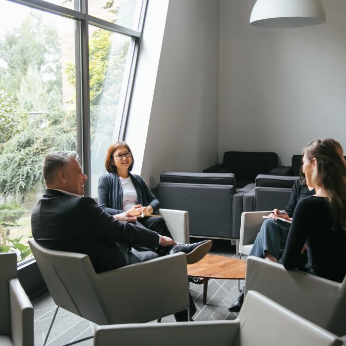 employees chatting in Commons