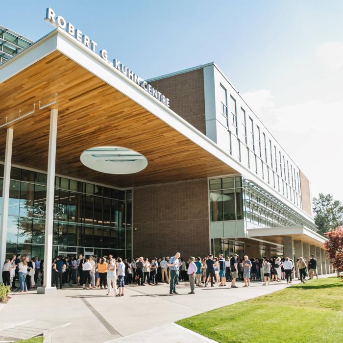 staff and faculty outside kuhn centre