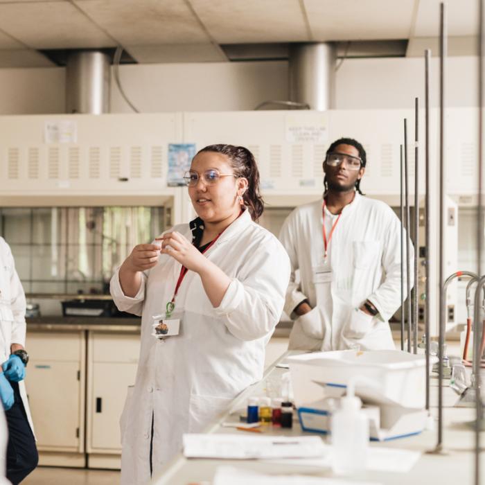 woman teaching in lab