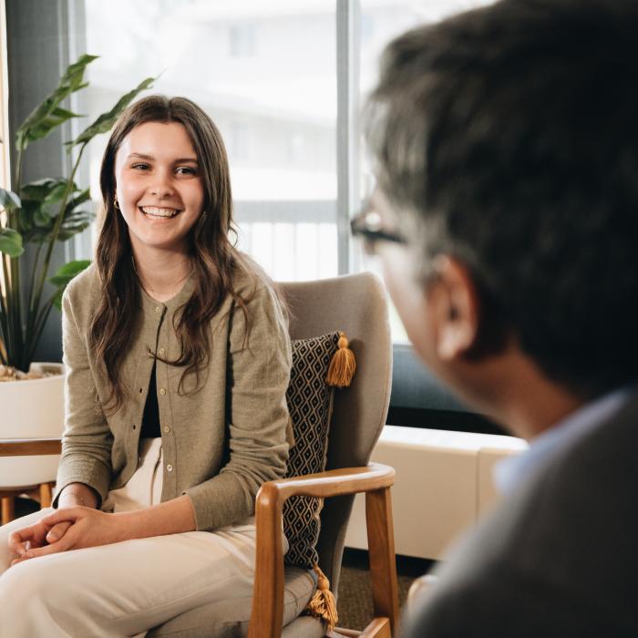 student talking to professor