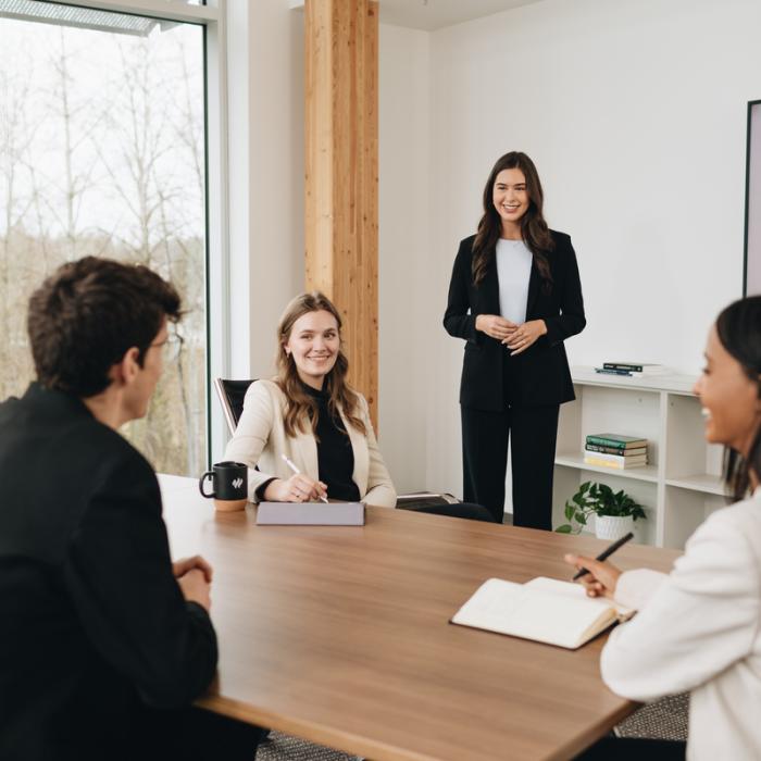 business students in classroom having a discussion