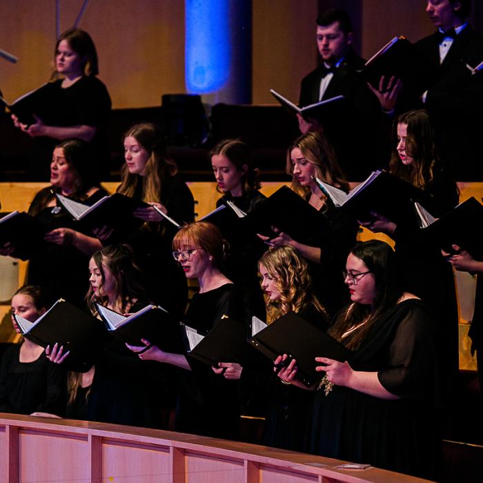 Student choir performing at the Christmas at the Chan