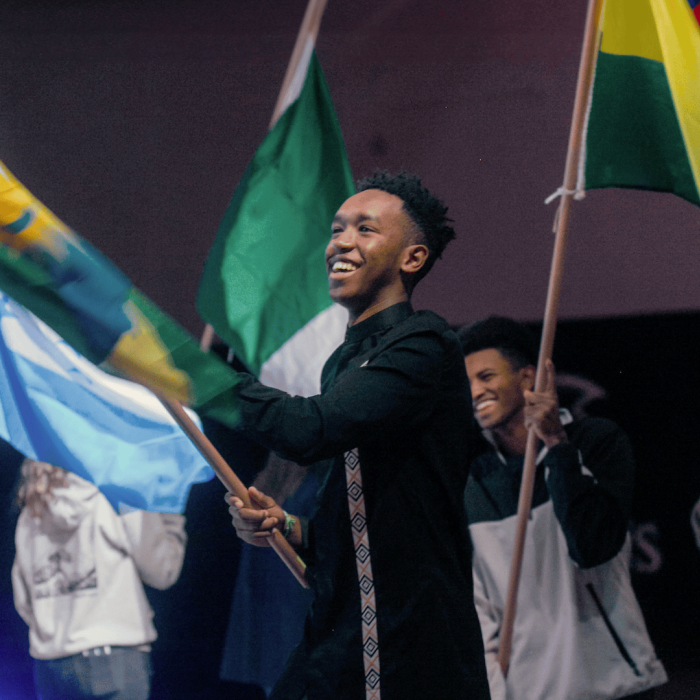 people waving flags from different countries