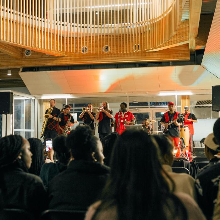 Music group playing with a crowd in Kuhn Centre Atrium 