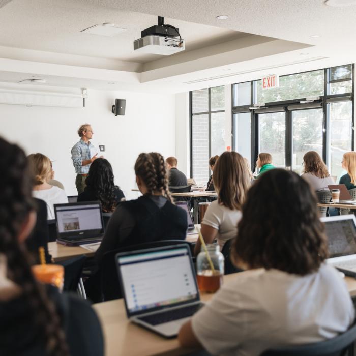 professor teaching a class of students