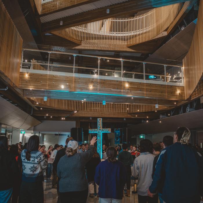 Students worshipping at Sunday Night Alive