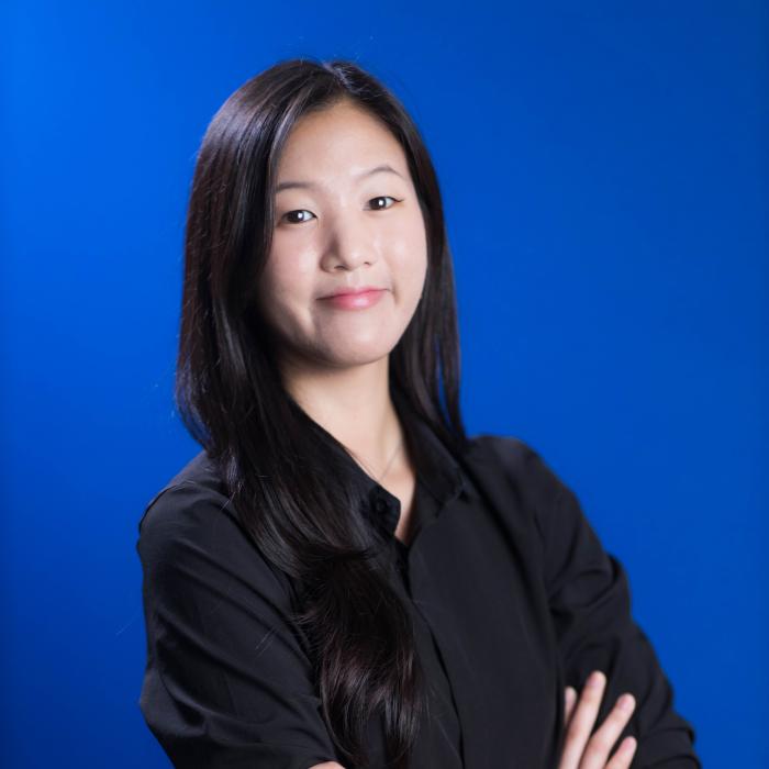 A photo of Yechan Kim posing and crossing her arms.