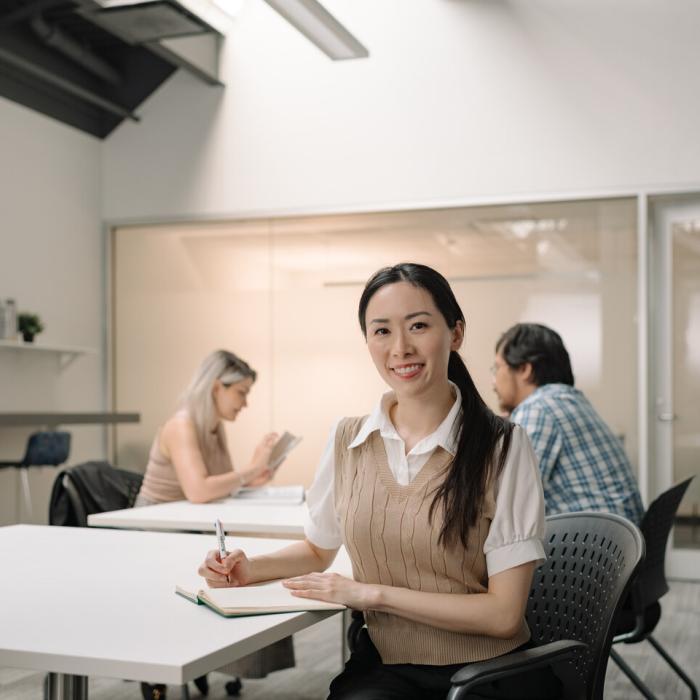 Student looking at camera and smiling