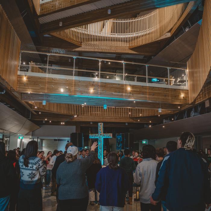 People Worshipping and singing.