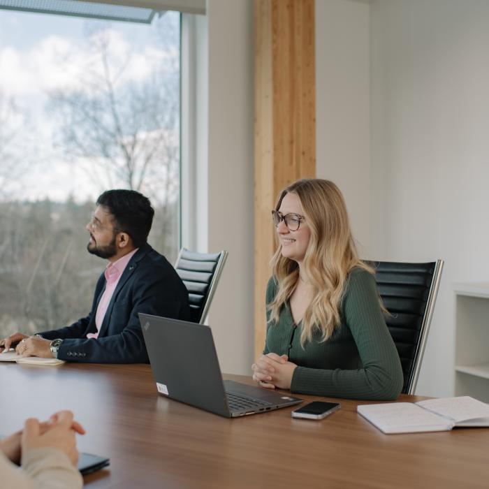 women working at table in meeting