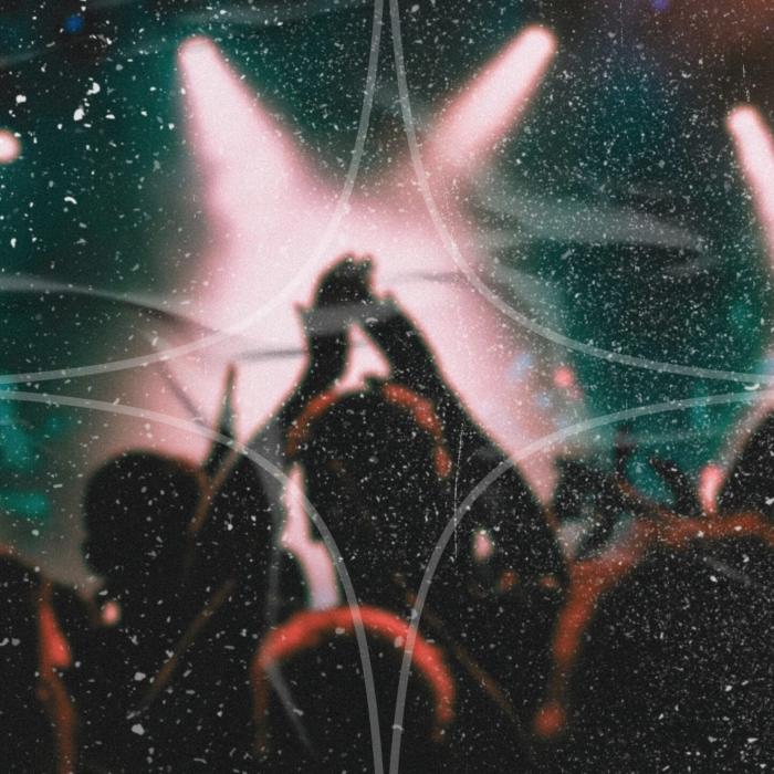 Silhouetted concert crowd with raised hands against bright stage lights, overlaid with a textured grain effect.
