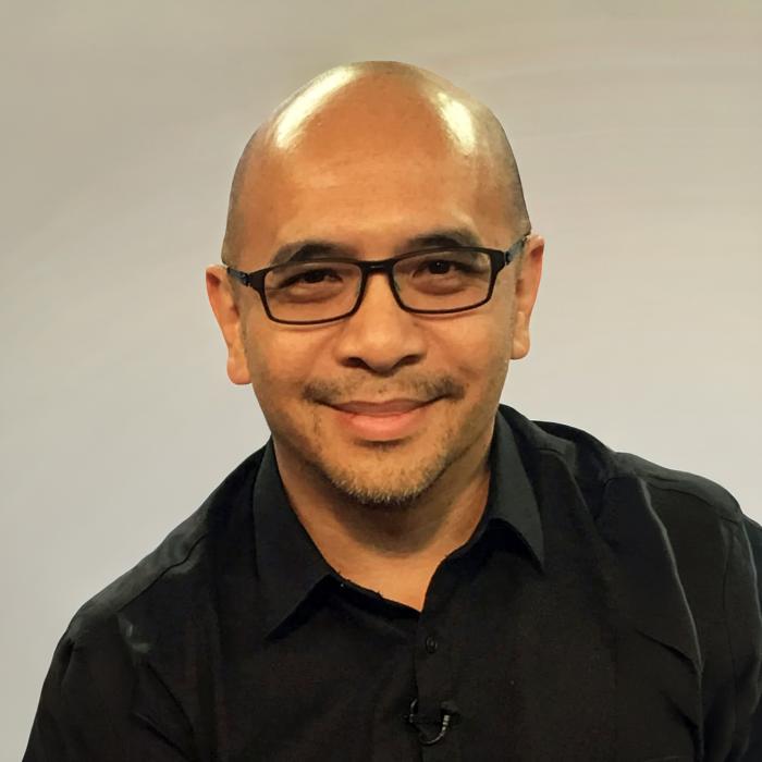 headshot of Clement Tong