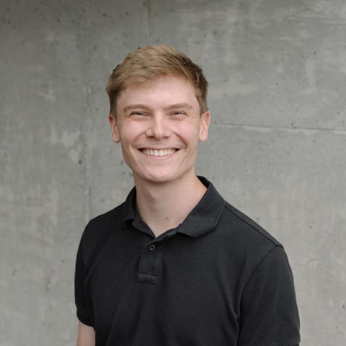 headshot image of Grey Zander