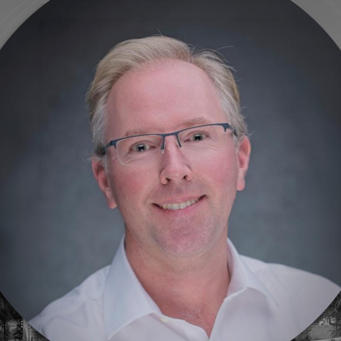 Headshot of Rev. Shaun Wick in a template for the Faculty Speaker Series.