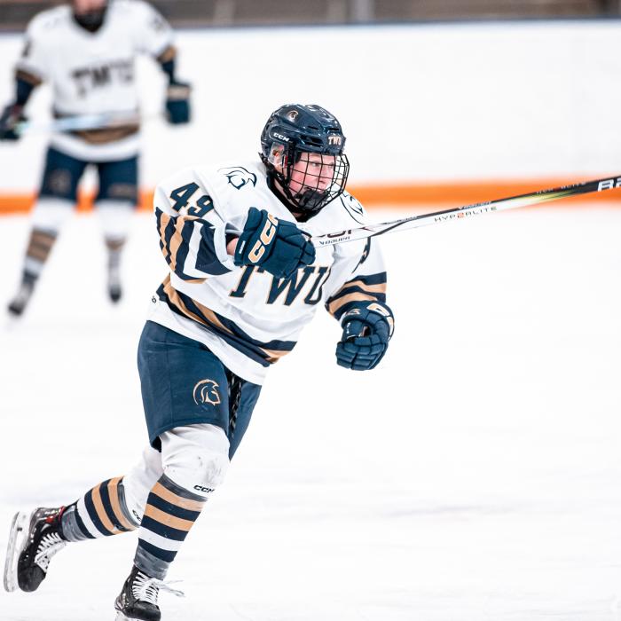 TWU student playing hockey 